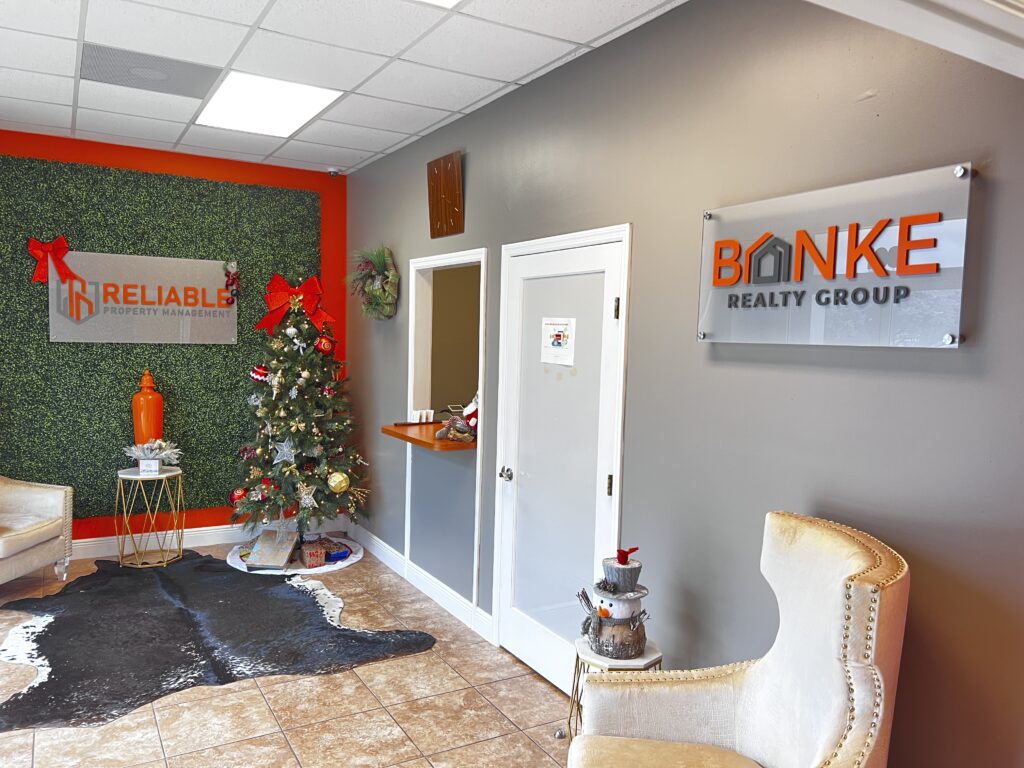 3d acrylic stand off sign with raised acrylic letters and frosted backing for real estate company
