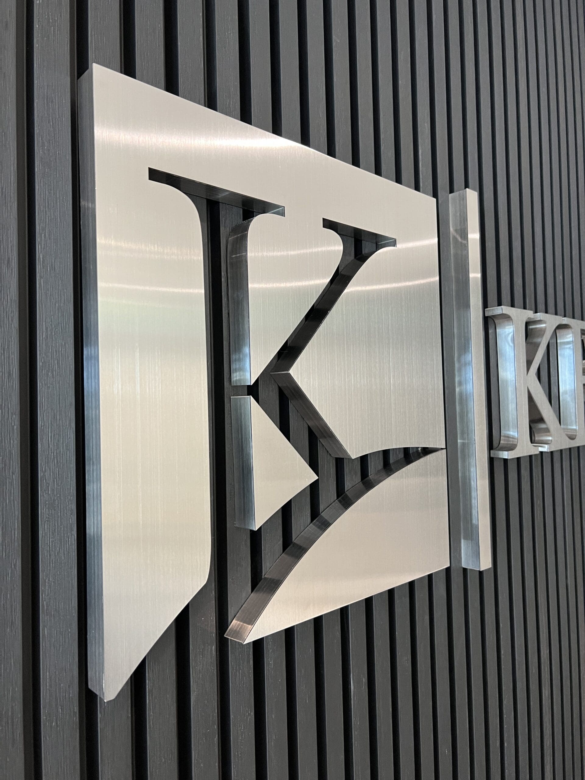 brushed metal reception lobby channel letter signs 27 scaled