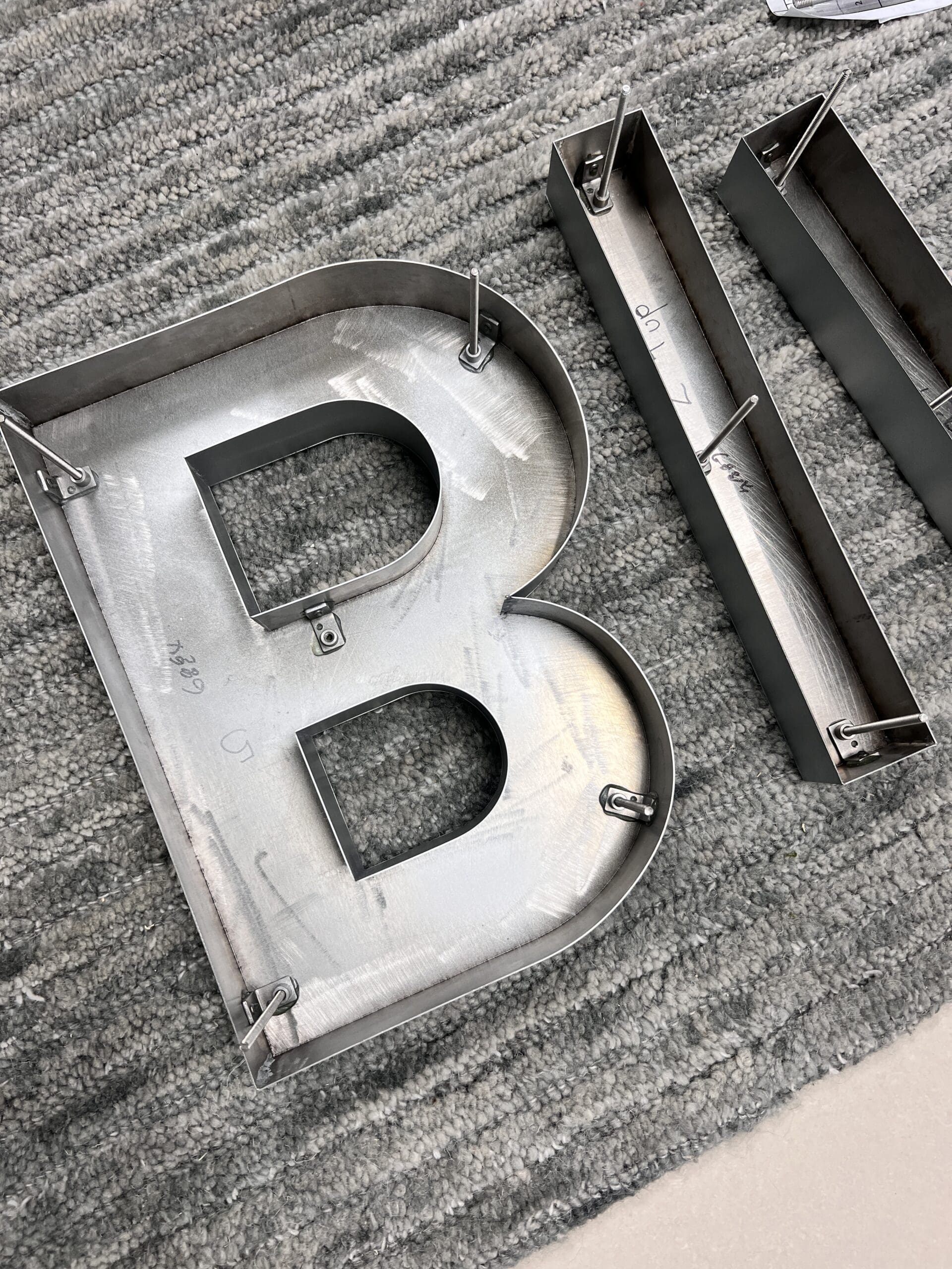 built channel letter signs with brushed metal face 3 scaled