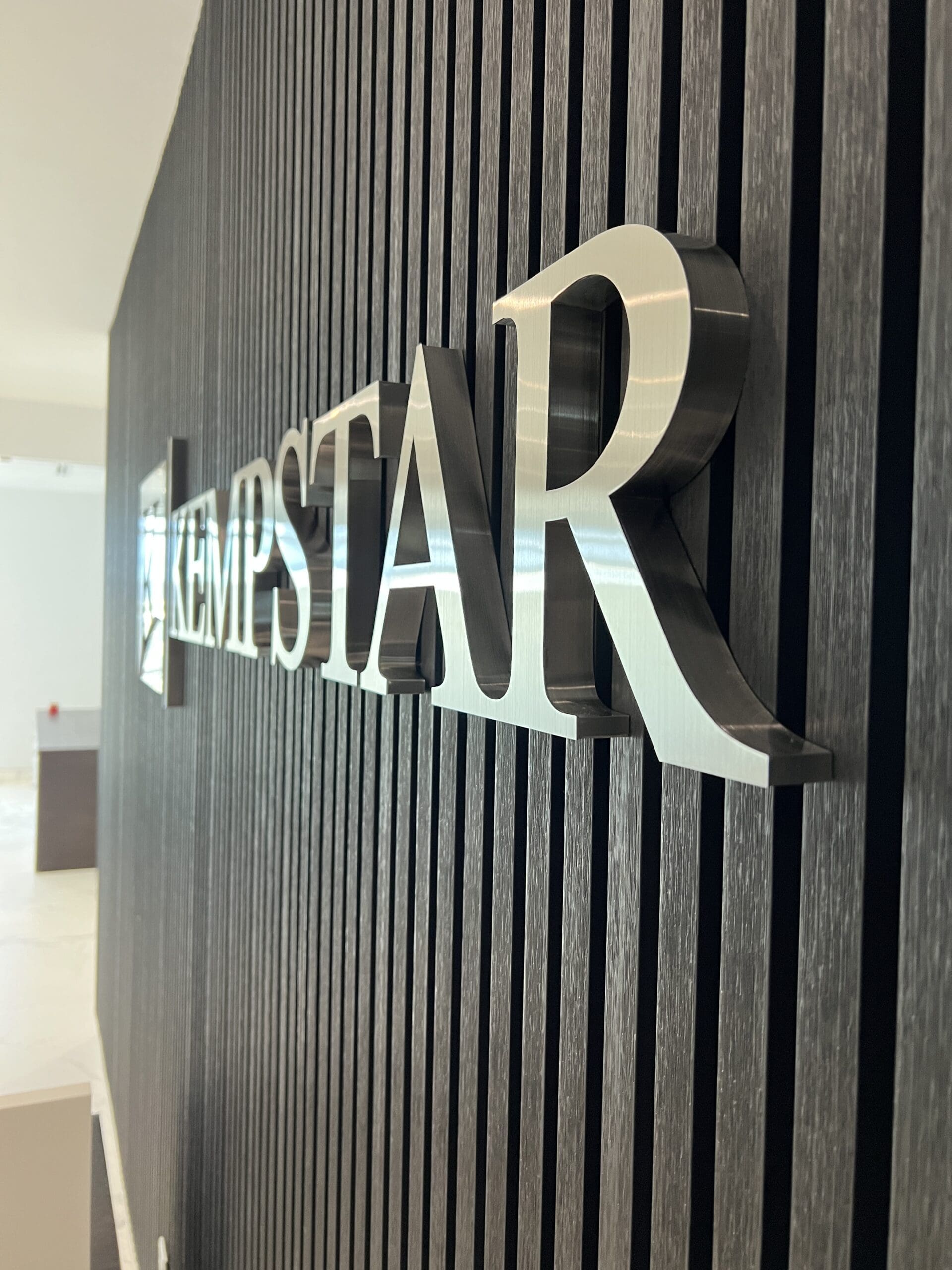 fabricated brushed steel letters scaled